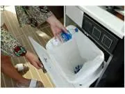 Slide: The Image of Person placing bottle in trash bin on 2024 Formula 500 Super Sport Crossover boat. - 38