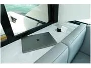 Slide: The Image of 2024 Formula 500 Super Sport Crossover interior with laptop on table. - 44