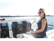 Slide: The Image of Woman enjoying a ride on a 2024 Formula 500 Super Sport Crossover boat. - 49
