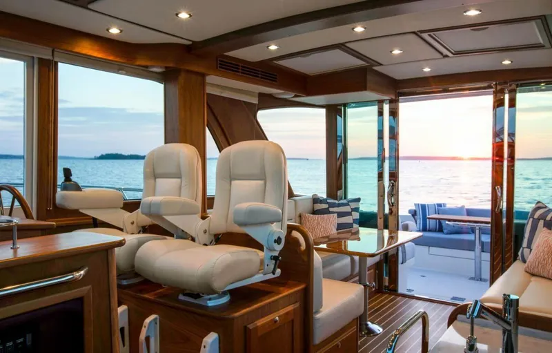 Slide: The Image of Luxurious interior of 2025 Sabre 43 Salon Express yacht at sunset. - 6