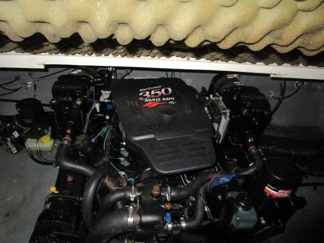Slide: The Image of Engine compartment of a 2004 Sea Ray 260 Sundancer with MerCruiser 350 MAG MPI engine. - 17