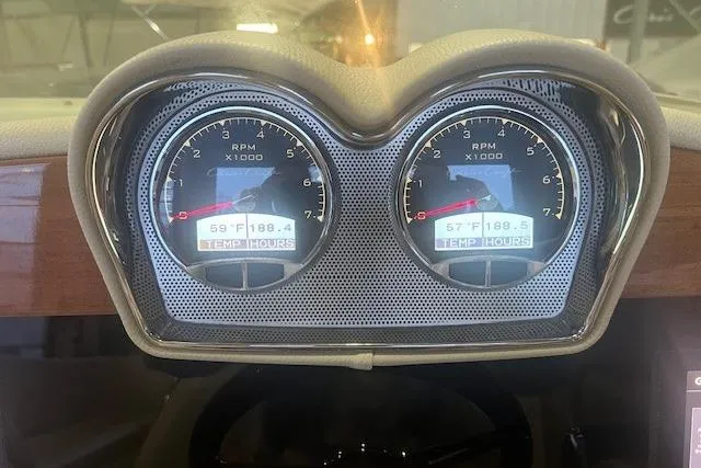 Slide: The Image of Dashboard gauges of a 2021 Chris-Craft Corsair 34 boat showing RPM and temperature. - 16
