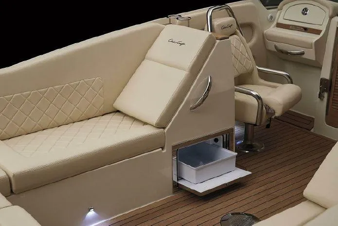 Slide: The Image of Luxurious interior of 2021 Chris-Craft Corsair 34 boat with beige seating and wood flooring. - 29