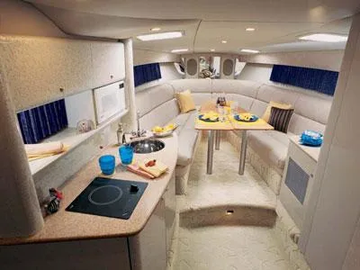 Slide: The Image of Dashboard of a 2002 Formula 370 Super Sport boat with gauges and steering wheel. - 12