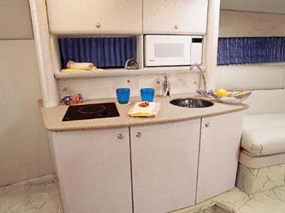 Slide: The Image of 2002 Formula 370 Super Sport boat docked in Newport, RI marina. - 14