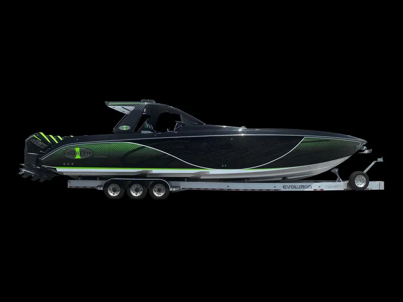 Slide: The Image of 2025 Cigarette 42 Auroris speedboat on a trailer, black and green design. - 5