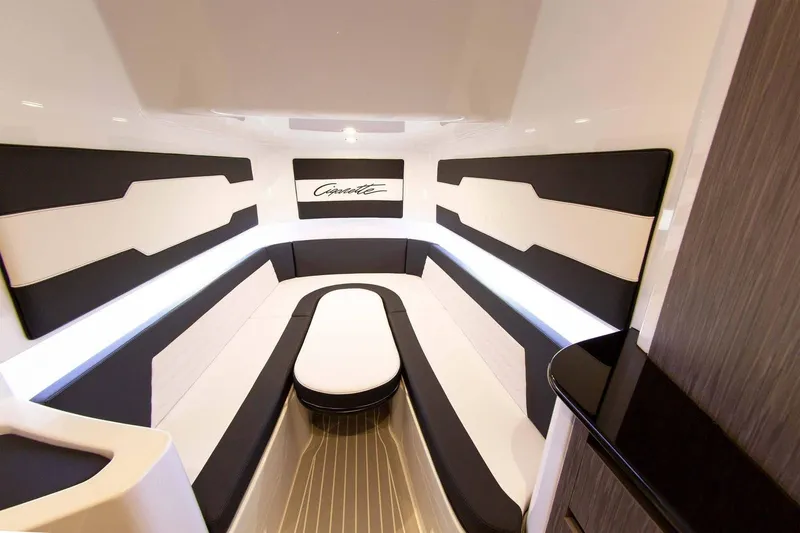 Slide: The Image of Interior of 2025 Cigarette 42 Auroris boat with modern black and white seating. - 9