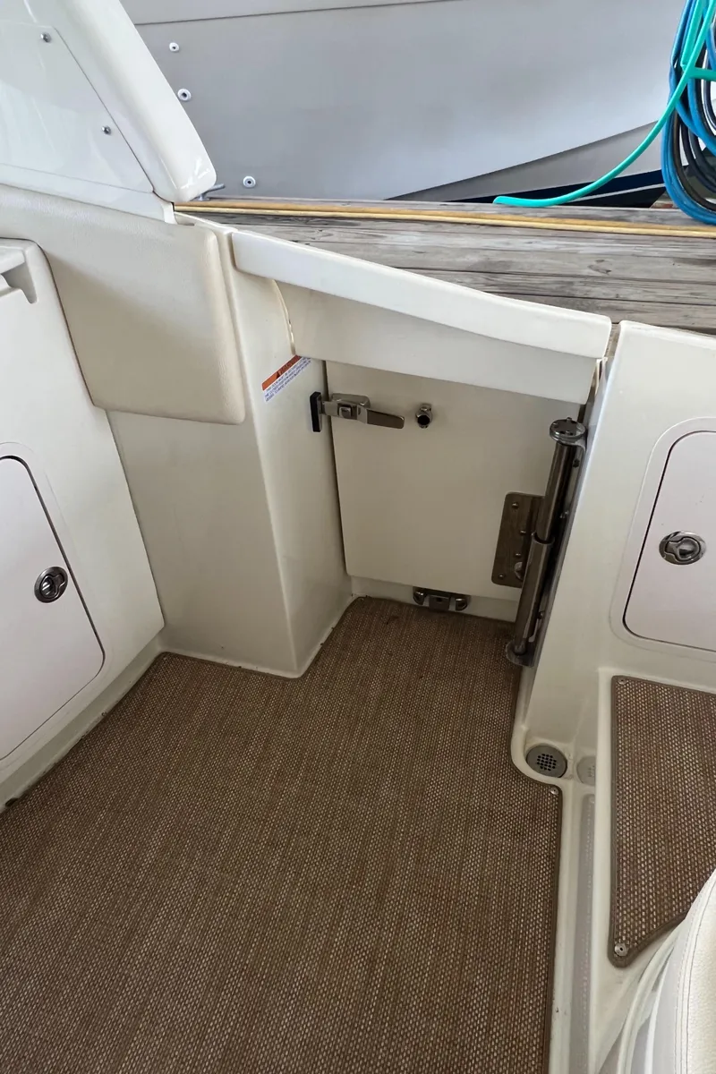 Slide: The Image of 2020 Chris-Craft Launch 31 GT boat interior with storage compartments. - 38