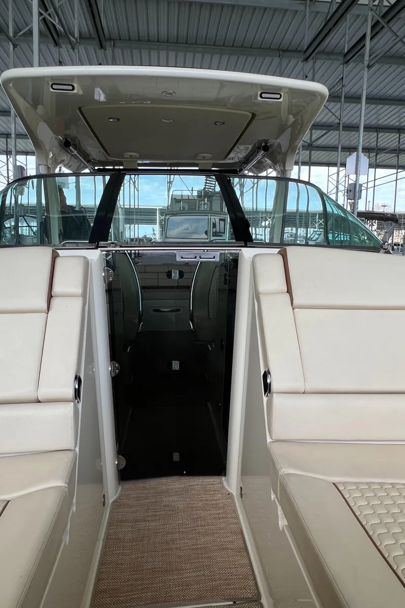 Slide: The Image of 2020 Chris-Craft Launch 31 GT interior view under covered dock. - 42
