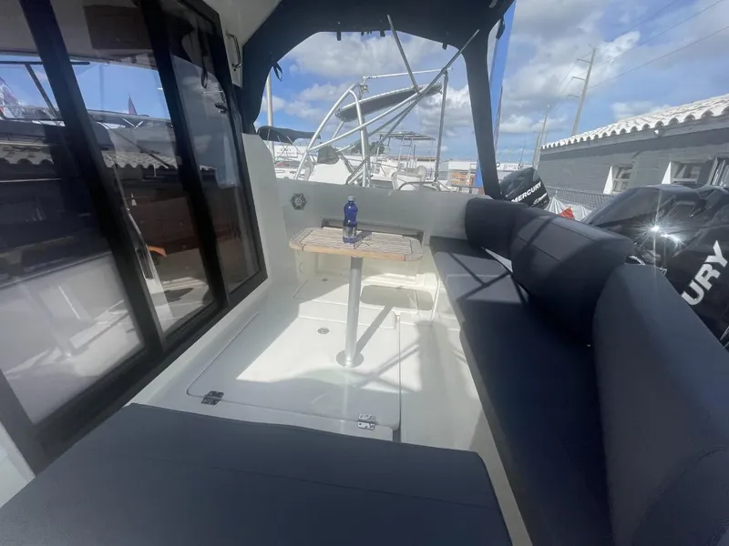 Slide: The Image of Parker 800 Weekend 2021 model boat with Mercury outboard engines at a marina. - 17