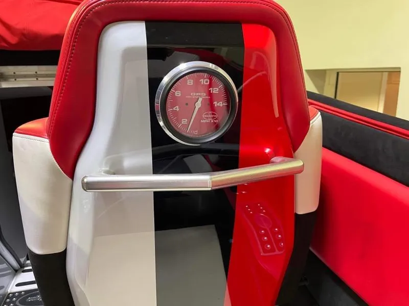 Slide: The Image of Red and black interior of 2016 Cigarette 50' Marauder with speedometer. - 15