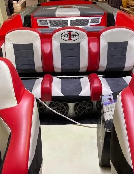 Slide: The Image of 2016 Cigarette 50' Marauder boat interior with red, white, and black seating. - 18