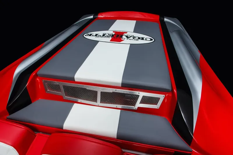 Slide: The Image of 2016 Cigarette 50' Marauder boat, red and gray design with logo, rear view. - 22