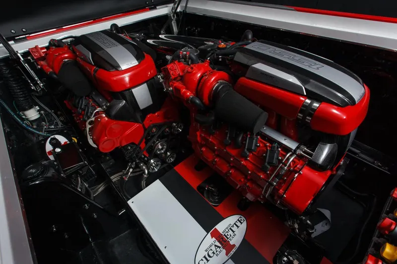 Slide: The Image of 2016 Cigarette 50' Marauder engine, featuring vibrant red and black components. - 23