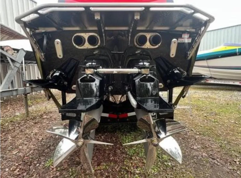 Slide: The Image of 2016 Cigarette 50' Marauder boat with dual propellers and powerful outboard engines. - 30