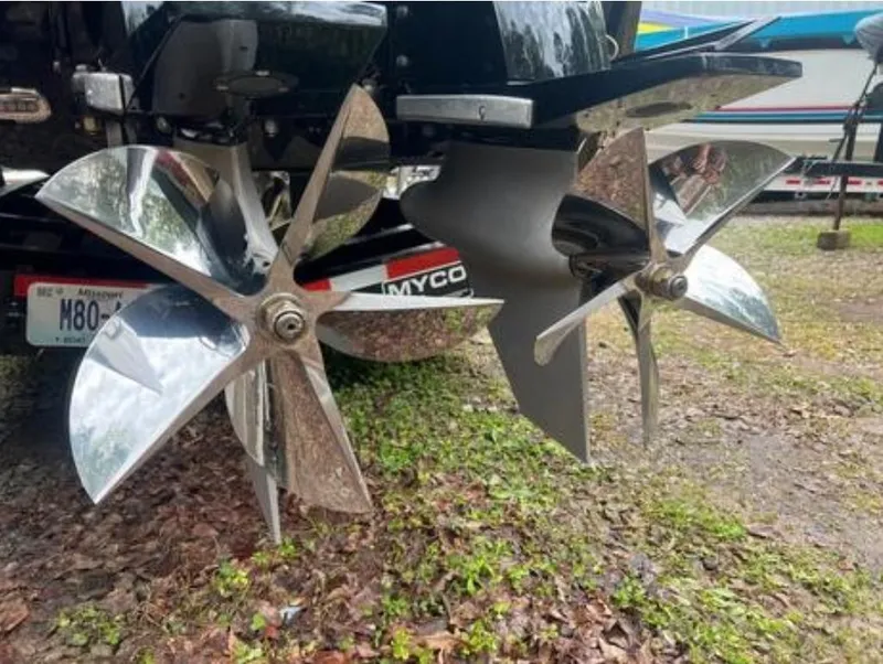 Slide: The Image of 2016 Cigarette 50' Marauder boat propellers on display, showcasing sleek, polished design. - 31