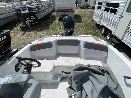 Slide: The Image of 2019 Tahoe T16 boat interior with seating and steering wheel. - 6