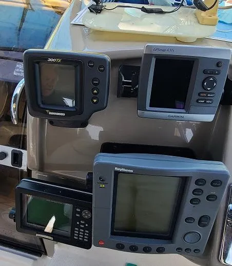 Slide: The Image of Navigation and radar equipment on a 1999 Bayliner 4085 Avanti boat. - 12