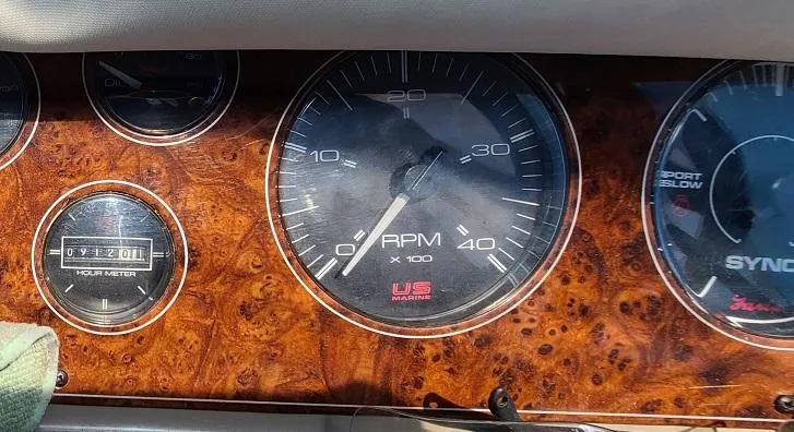 Slide: The Image of Dashboard of a 1999 Bayliner 4085 Avanti boat with RPM gauge. - 13