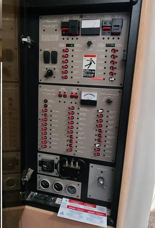Slide: The Image of Electrical control panel of a 1999 Bayliner 4085 Avanti boat. - 25