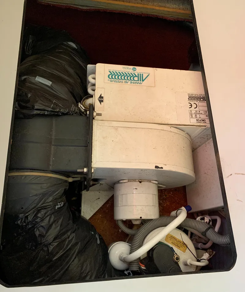 Slide: The Image of Air conditioning unit in 1991 Sea Ray 290 Sundancer boat. - 24