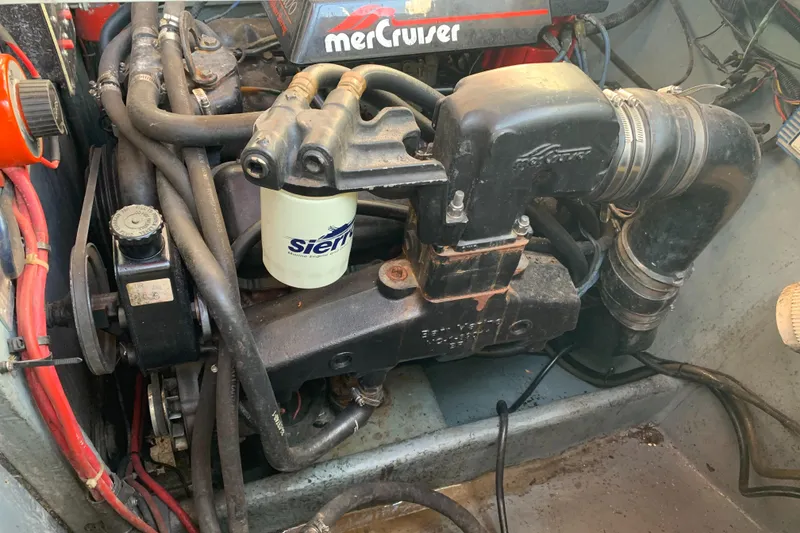 Slide: The Image of Engine compartment of a 1991 Sea Ray 290 Sundancer with MerCruiser components. - 37