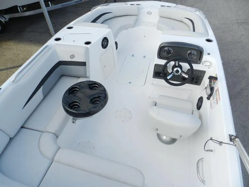 Slide: The Image of 2023 Hurricane 188 boat interior with steering console and seating. - 3