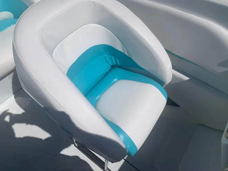 Slide: The Image of White and blue seat on a 1999 Baja 29 Outlaw SST boat. - 15
