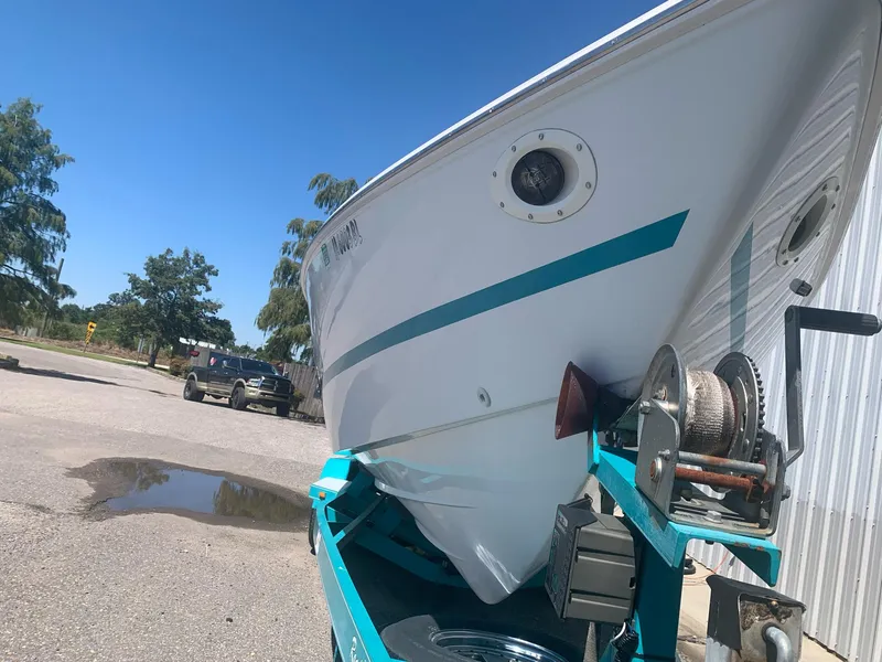 Slide: The Image of 1999 Baja 29 Outlaw SST boat on a trailer, close-up view of the bow. - 29