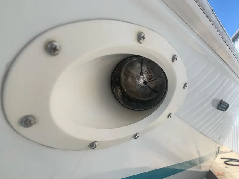 Slide: The Image of Close-up of a 1999 Baja 29 Outlaw SST boat's exterior light fixture. - 31