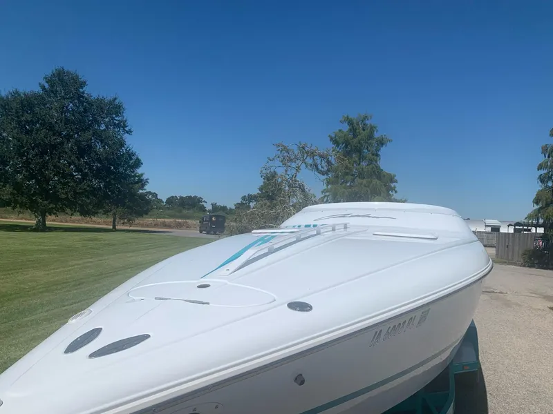 Slide: The Image of 1999 Baja 29 Outlaw SST speedboat on a sunny day. - 37