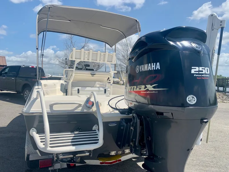 Slide: The Image of 2016 Skeeter SX230 boat with Yamaha 250 outboard motor, rear view. - 4