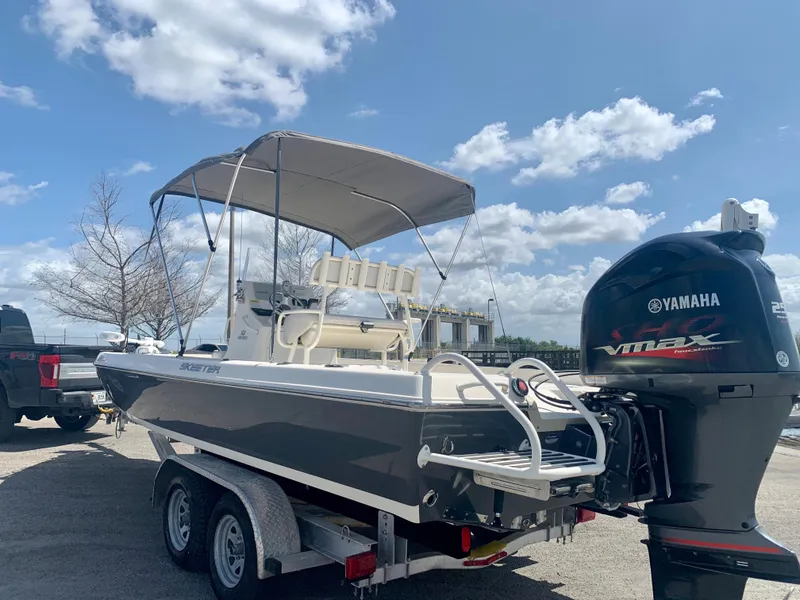 Slide: The Image of 2016 Skeeter SX230 boat on trailer with Yamaha VMAX outboard motor. - 5
