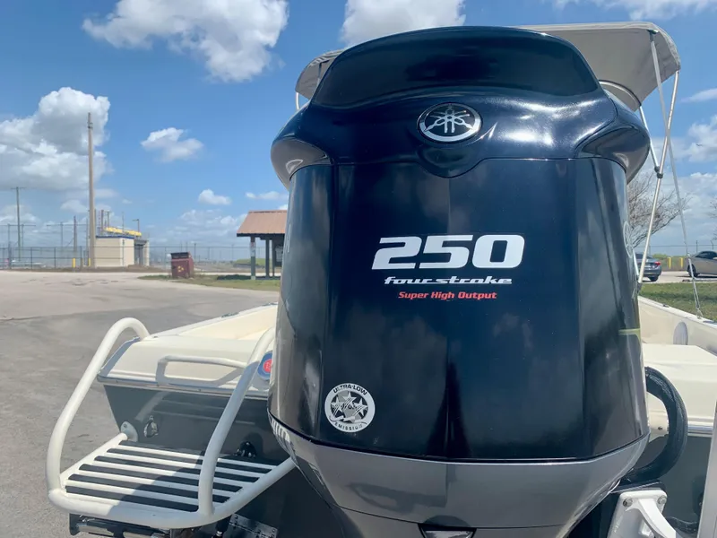 Slide: The Image of 2016 Skeeter SX230 boat with 250 horsepower four-stroke engine. - 7