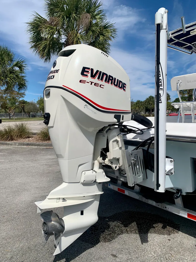 Slide: The Image of 2005 ShearWater z2400 with Evinrude E-TEC outboard motor. - 4