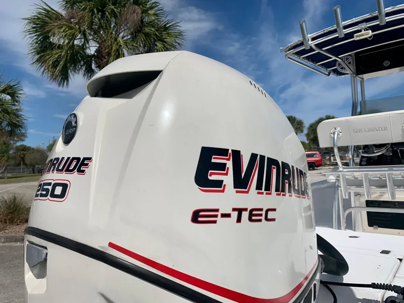 Slide: The Image of Close-up of Evinrude E-TEC 250 outboard motor on 2005 ShearWater z2400 boat. - 6