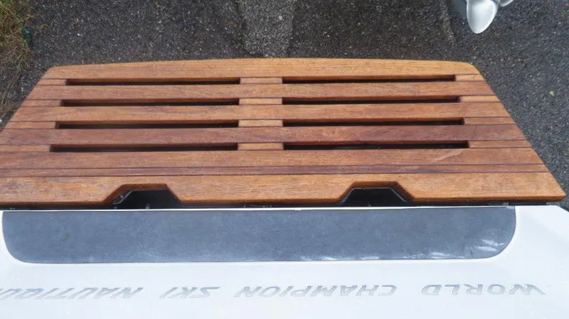 Slide: The Image of 1990 Nautique Ski boat wooden swim platform. - 9