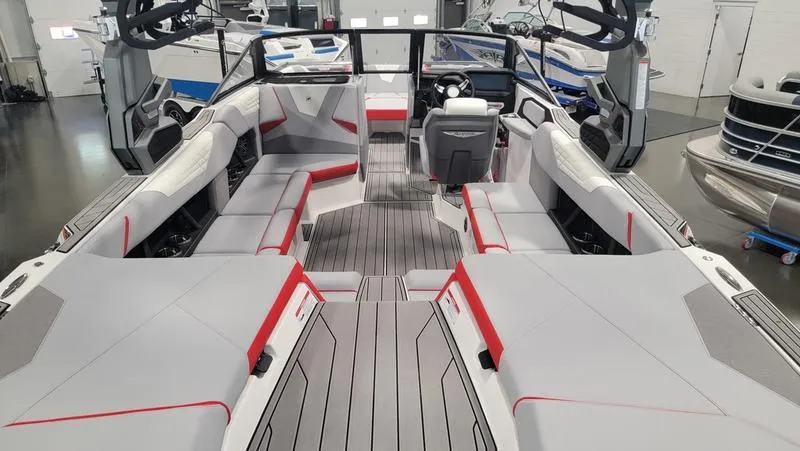 Slide: The Image of 2022 Nautique Super Air Nautique S23 interior with sleek seating and modern design. - 4
