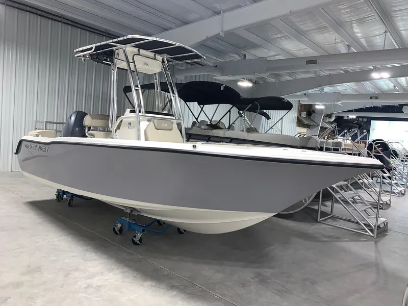 Slide: The Image of 2024 Key West 203 FS boat in showroom. - 2