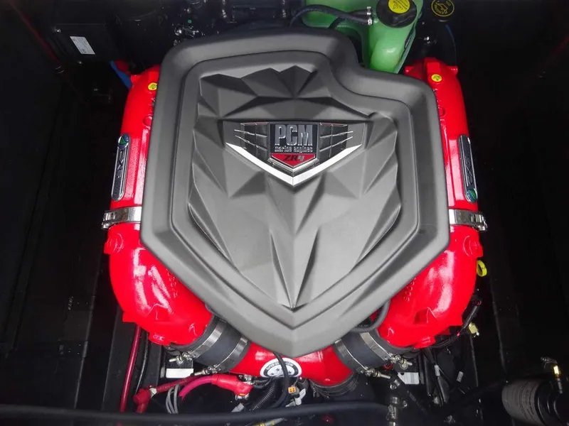 Slide: The Image of 2023 Nautique S21 PCM engine with red components. - 18