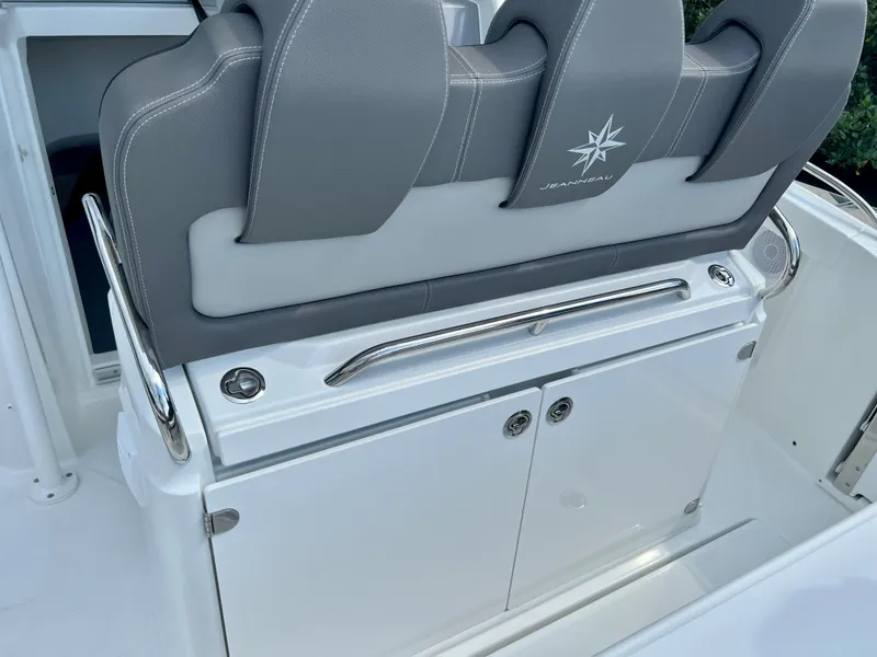 Slide: The Image of 2024 Jeanneau Leader 9.0 CC boat seating and storage area. - 16