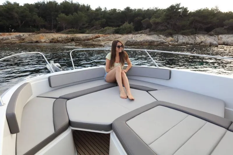 Slide: The Image of 2024 Jeanneau Leader 9.0 CC boat cockpit with Garmin navigation system. - 6