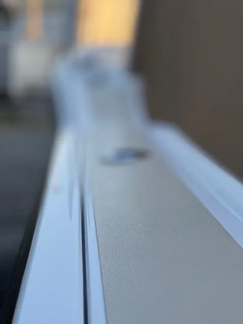 Slide: The Image of Close-up of a 2022 NorthCoast 235 HT boat detail, showcasing sleek design elements. - 5