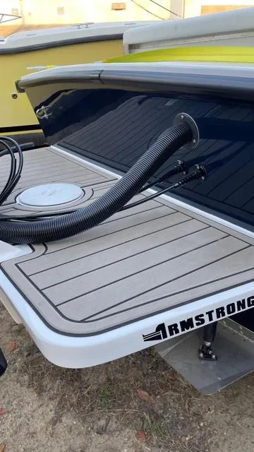 Slide: The Image of 2022 NorthCoast 235 HT boat with Armstrong platform and hoses on deck. - 8