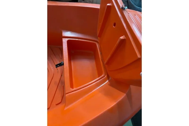 Slide: The Image of Orange River Boats 350, 2022 model, featuring an open storage compartment. - 3