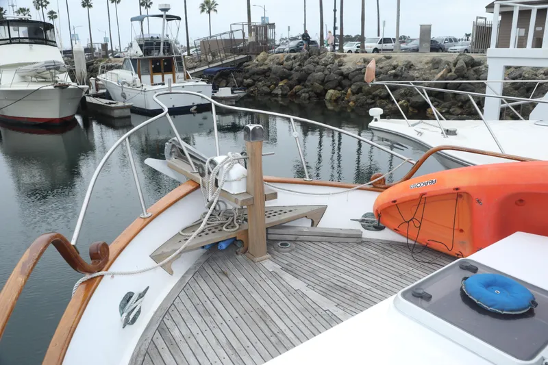 Slide: The Image of 1979 Sea Ranger 37 yacht in harbor, bow deck view. - 1