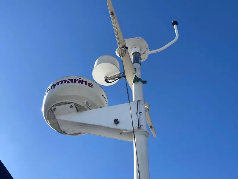 Slide: The Image of Radar antenna on a 1979 Sea Ranger 37 boat against blue sky. - 37