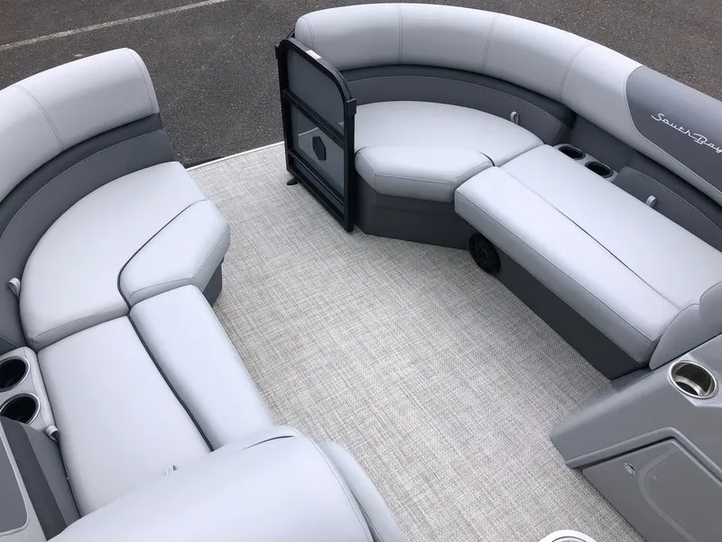 Slide: The Image of 2023 South Bay S224CR2 2.75 pontoon boat interior with gray seating and cup holders. - 14