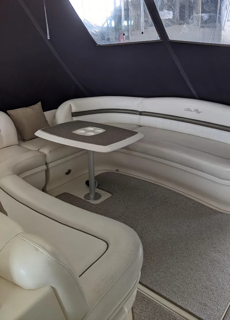 Slide: The Image of Interior seating area of a 2006 Sea Ray 44 Sundancer yacht with a table. - 10