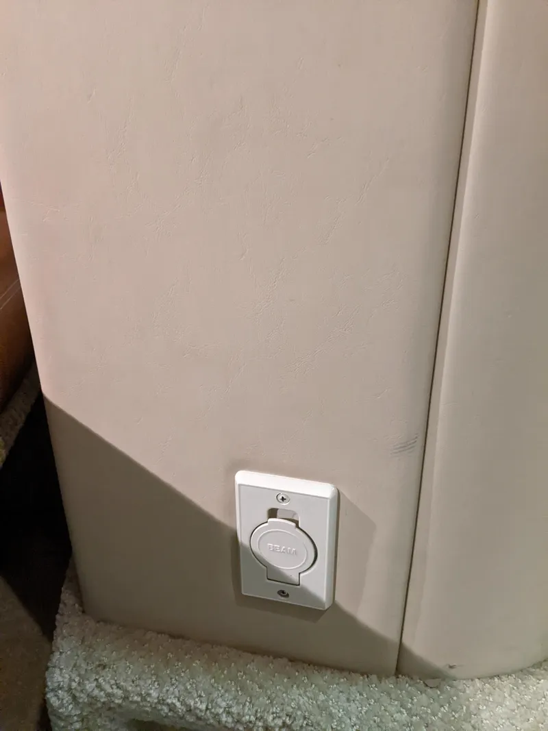 Slide: The Image of Electrical outlet on a 2006 Sea Ray 44 Sundancer yacht interior. - 30